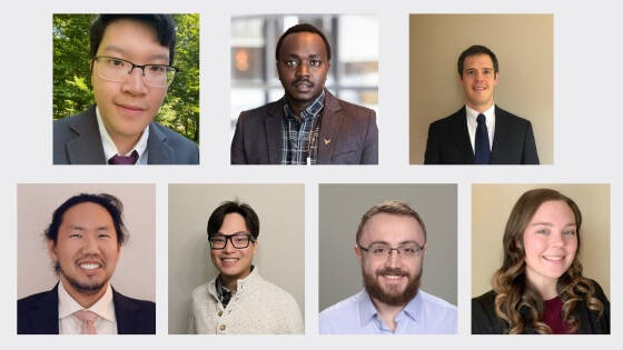 A group of seven individuals dressed in formal and business attire stand or sit against plain or lightly patterned backgrounds. Some wear suits with ties, others are in sweaters or button-down shirts, and one figure has long, styled hair.